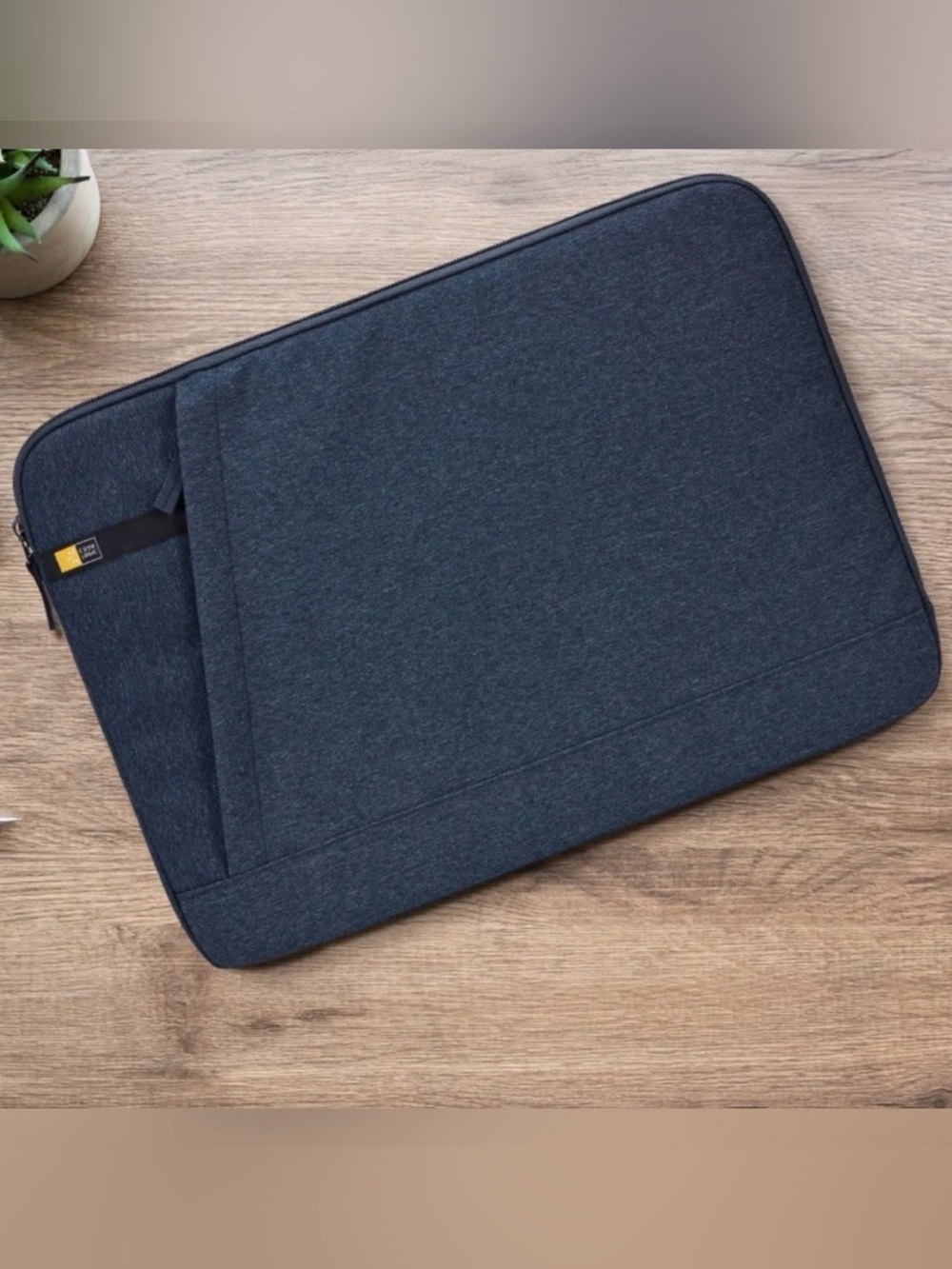 blue Case Logic Huxton laptop sleeve designed to fit 15.6-inch devices